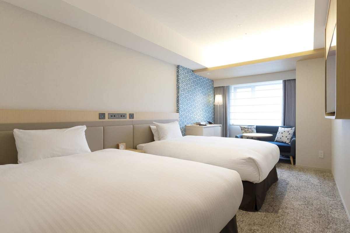 ホテルエミオン札幌 ホテル直結のコンビニなどで使える500円の利用券付（素泊まり）